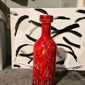 Vibrant Red and White Textured Glass Bottle